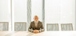 © BGStock72 - Senior business man sitting in the boardroom at the office