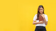© snowing12 - Women are holding holy bible and praying to god with empty space on isolated yellow background