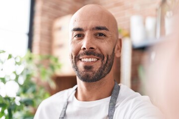 Sticker - Young bald man florist smiling confident make selfie by camera at florist