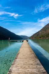 Wall Mural - Lake Weissensee in Carinthia. Jetty at the east riverbank close to Stockenboi.