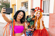 © kleberpicui - Brazilian Carnival. Group of friends taking a self portrait