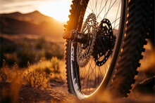  A Bike Tire With A Mountain Bike In The Background At Sunset Or Sunrise Or Sunrise, With The Sun Shining On The Bike Wheel And The Tire, And The Tire, In The Foreground. Generative Ai