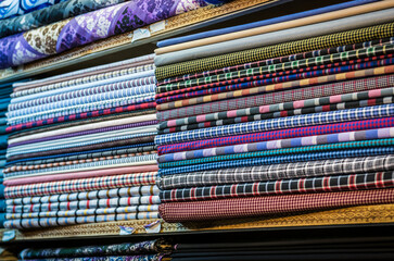 Sticker - Fabrics for sale on old Bazaar of Kashan in Iran