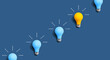 © Tierney - One out unique idea light bulb concept - Flat lay