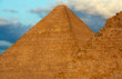 Part of pyramid of Khafre or of Chephren and Great Pyramid of Giza, pyramid of Khufu or Cheops behind in evening light