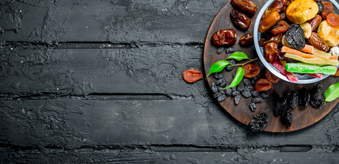 Wall Mural - Different dried fruit in a bowl.