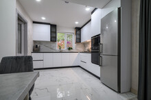A Recently Renovated Kitchen With Sleek, Modern Appliances