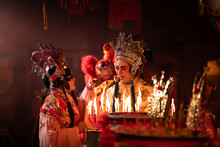Male And Female Chinese Opera Actors Light A Candle To Pray Homage To The Gods To Enhance The Prosperity For Yourself On The Occasion