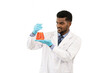 © Wongsakorn - Happy male scientist working in lab. Smiling Scientist woman with Red liquid in a researcher test tube. isolated on white background.