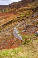 Wall Mural - Hiking in the Colorful Autumn hills of Connemara along Killary Fjord in the West of Ireland