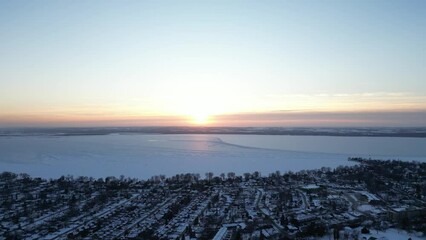 Wall Mural - Lake Simcoe Ontario during sunset in the winter time new market and barrie views 