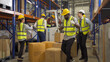 © tampatra - Teamwork group of multi ethnic workers working in large warehouse retail store industry factory. Stock storage. Cargo in ecommerce and logistic concept. Depot. People lifestyle. Shipment service.