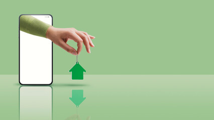 Real estate app and agent holding house key