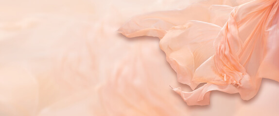  abstract peach flying fabric as background