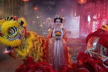 Girl In Chinese Traditional Dress In Temple Translation Language Is 'lucky And Prosperity For All'