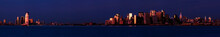 A Panoramic View Of The Manhattan And Jersey Skylines At Dusk.