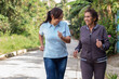 © Anderson Piza - Cheerful elderly mother and daughter jogging outdoors in a morning exercise. Healthy living concept