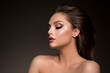 Glamour portrait of beautiful woman model with fresh daily makeup and romantic hairstyle. 