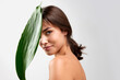 © Lustre Art Group  - Portrait of beautiful happy young woman with smooth clear skin isolated over light studio background. Concept of natural beauty, skincare, cosmetology, health