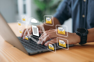 Leinwandbilder - Online documentation database and document management system concept. A businessman works on his laptop with a virtual screen. Process automation is needed to efficiently manage files.