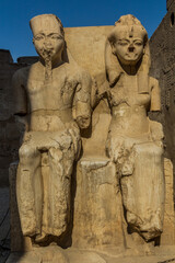 Wall Mural - Statue of King Tutankhamun and wife at the Luxor temple, Egypt