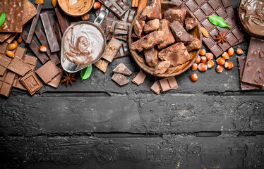 Poster - Chocolate background. Various assortment of chocolate with paste.