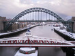Newcastle Upon Tyne and the Tyne Bridge in Winter covered in snow