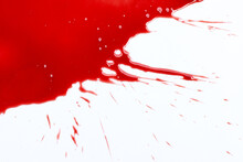 Drops Of Blood On White Background.