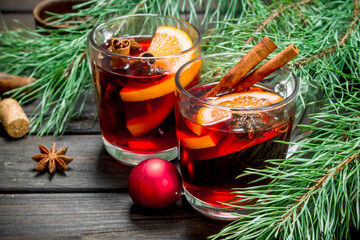 Poster - Christmas hot mulled wine with spices and aromatic herbs.