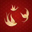 Golden swallow flying on red wave background