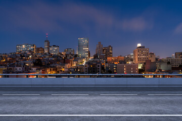 Empty urban asphalt road exterior with city buildings background. New modern highway concrete construction. Concept way to success. Transportation logistic industry fast delivery. San Francisco. USA.