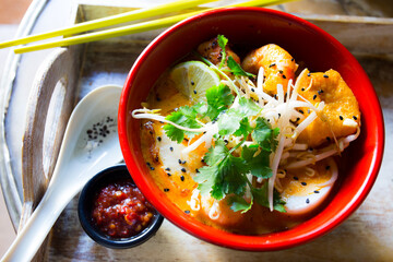 Wall Mural - Chinese soup with fried tofu and shrimp.