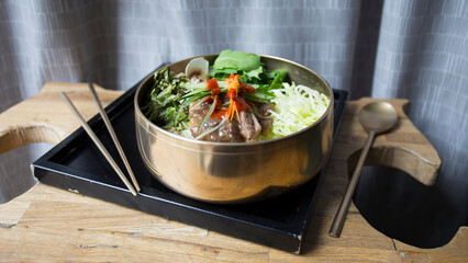 Wall Mural - Spicy beef meat salad with vegetables. Traditional asian recipe.