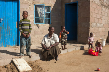 Wall Mural - african granny with her grand children