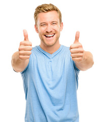 A handsome young man standing alone in the studio and showing a thumbs up isolated on a PNG background.