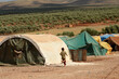© John Wreford  - Atmeh Refugee Camp, Idlib, Syria. June 19th 2013. .Internally displaced child Syrian refugees in the Atmeh refugee camp, Idlib province Syria.
