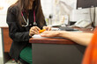 © Austockphoto - close up shot of a female doctor checking a patient's pulse with an oximeter