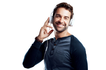 Wall Mural - A handsome young man using headphones isolated on a PNG background.