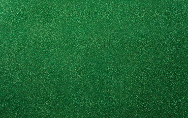 Wall Mural - Happy St Patrick's Day decoration background concept made from green glitter paper.