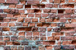 Texture red-brick wall of Tartu Cathedral. The image of old red stone wall for use as a background. Old ruined brick stone wall background.