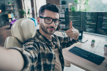 photo of professional smart hacker guy sitting chair take selfie hand finger show thumb up workstati