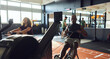 © Flamingo Images - People working out on rowing machines