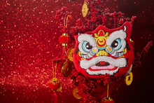 Chinese Lion Dance For Chinese New Year With Red Lanterns In The Background