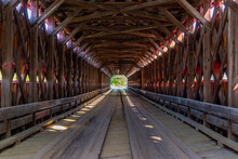 Inside Of A Red Wooden Covered Bridge, Quebec, Canada