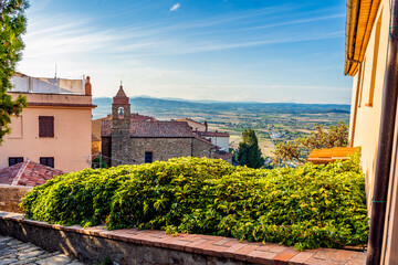 Wall Mural - Church of San Martino, old parish church of Scarlino with beautiful panorama of Tuscan countryside, medieval town of Scarlino, province of Grosseto, Tuscany region, Italy