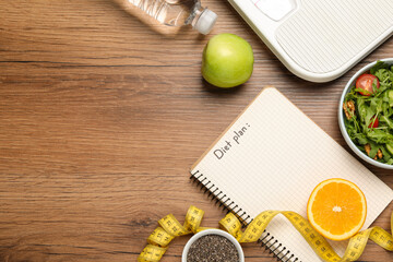 Sticker - Weight loss concept. Flat lay composition with notebook, measuring tape and different products on wooden table, space for text