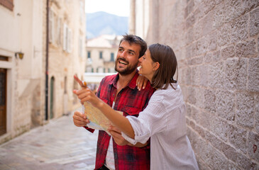 Wall Mural - Happy love couple visiting old tourist places