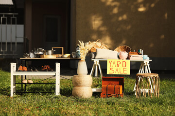 Wall Mural - Table with different stuff and sign Yard sale outdoors