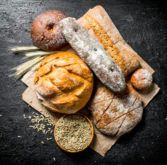 Wall Mural - The range of different types of bread from rye and wheat flour.