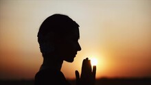 Indian Girl Woman Silhouette At Sunset. Dark Figure Of Female Face. Hands Girl Shape Namaste. Summer Dream. Folk Ethnic Lifestyle Concept. Lady From India Dancing. Orange Levening Ight. Woman In Sari